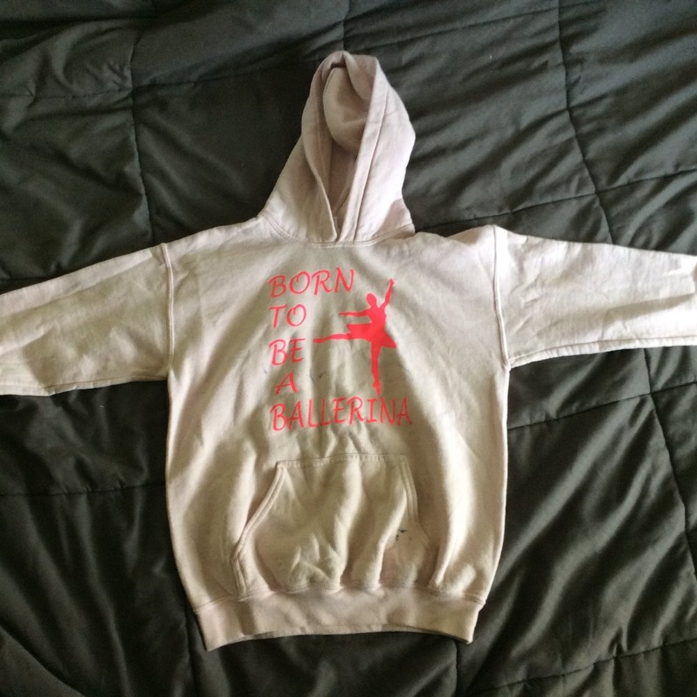 a girls pink sweatshirt